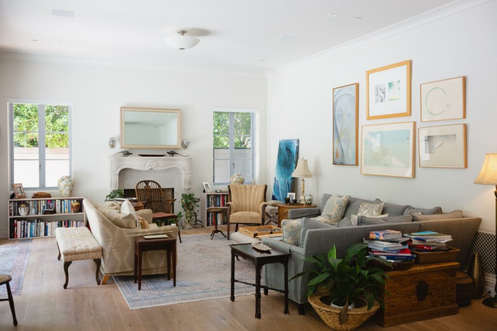 living room with couches and wall art