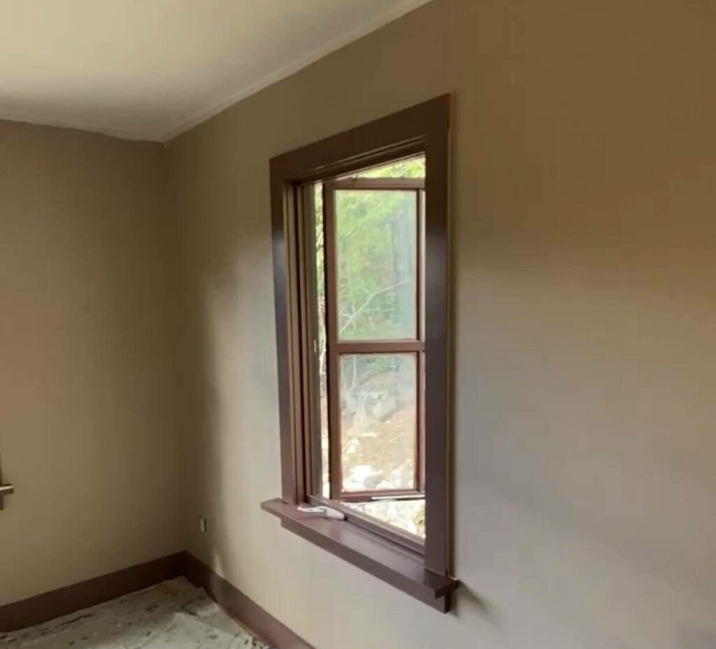 Side window painted with "hot chocolate" trim and "band aid" walls.